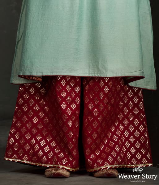 Hand front boota embroidered munga silk suit in light blue color with brocade palazzo