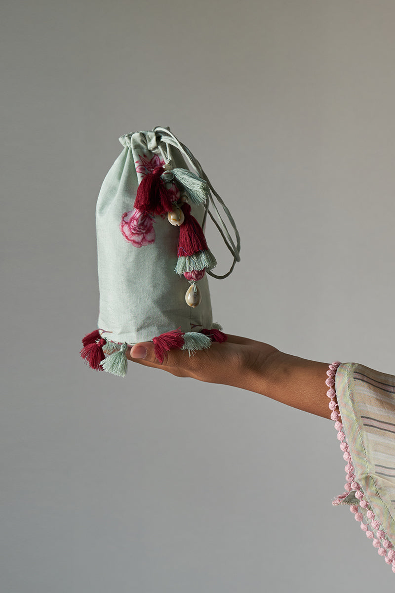 Beautiful Tassel Enhanced Fabric Potli