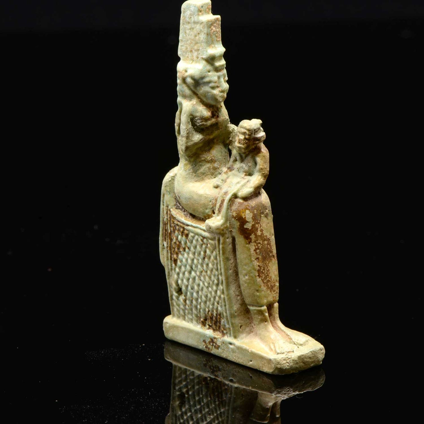 An Egyptian Faience Isis & Horus Amulet, 26th Dynasty, ca. 664-525 BCE
