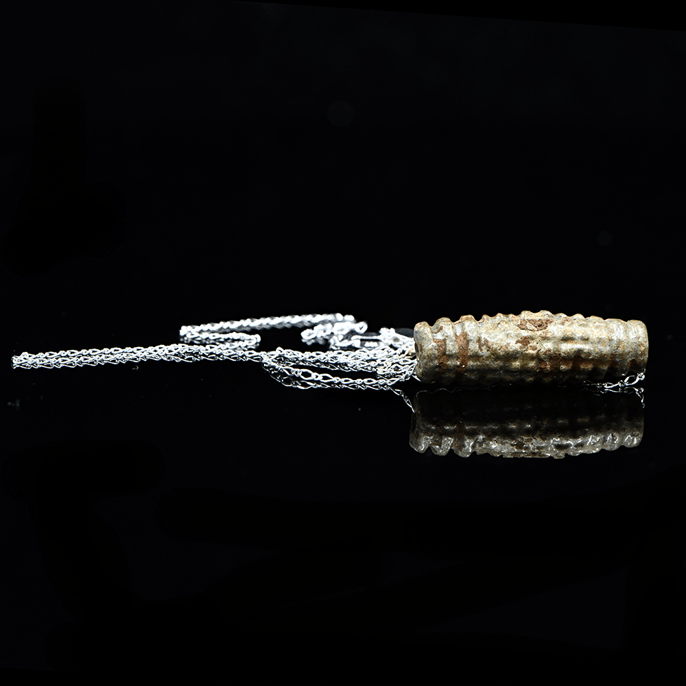 An Egyptian Faience Bead set as a pendant, Late Period, ca. 664 - 332 BCE