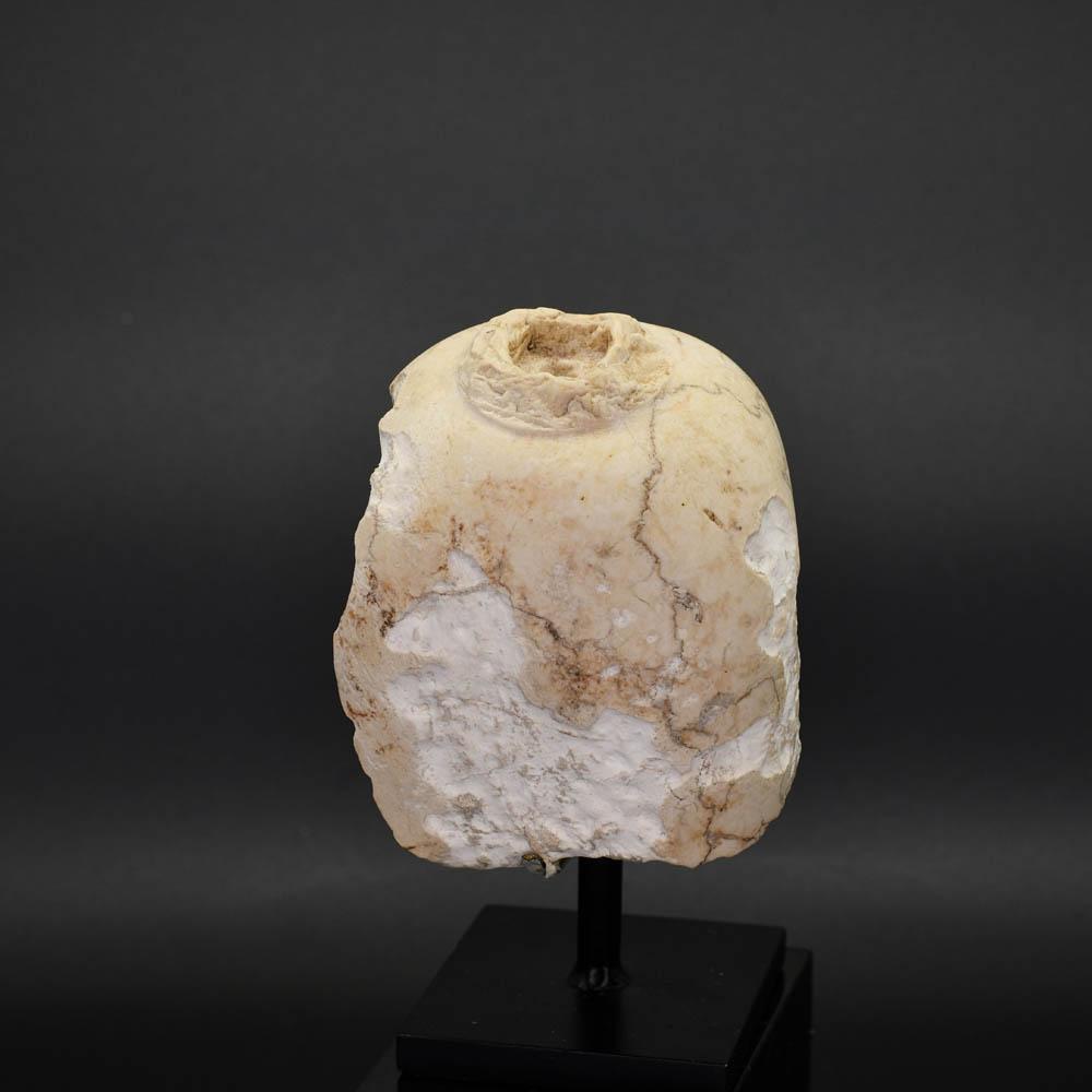 An Egyptian Carved Stone Head of Isis, Ptolemaic Period, ca. 332 - 30 BCE