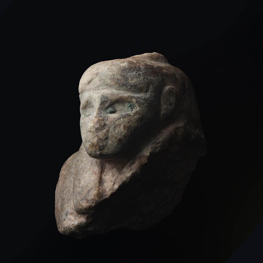 An Egyptian Stone Bust, Late Period, ca. 664 - 332 BCE