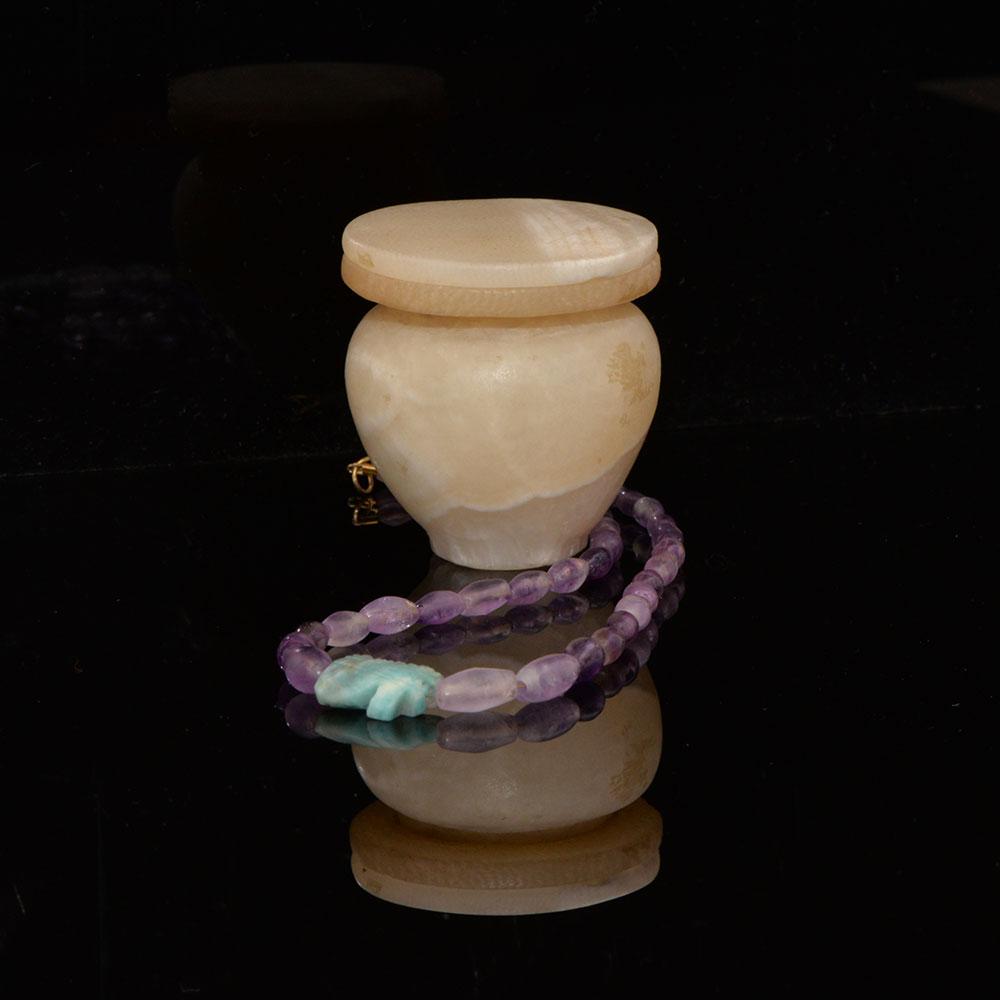 An Egyptian Alabaster Cosmetic Vessel with Lid, Middle Kingdom, ca. 2040-1786 BCE