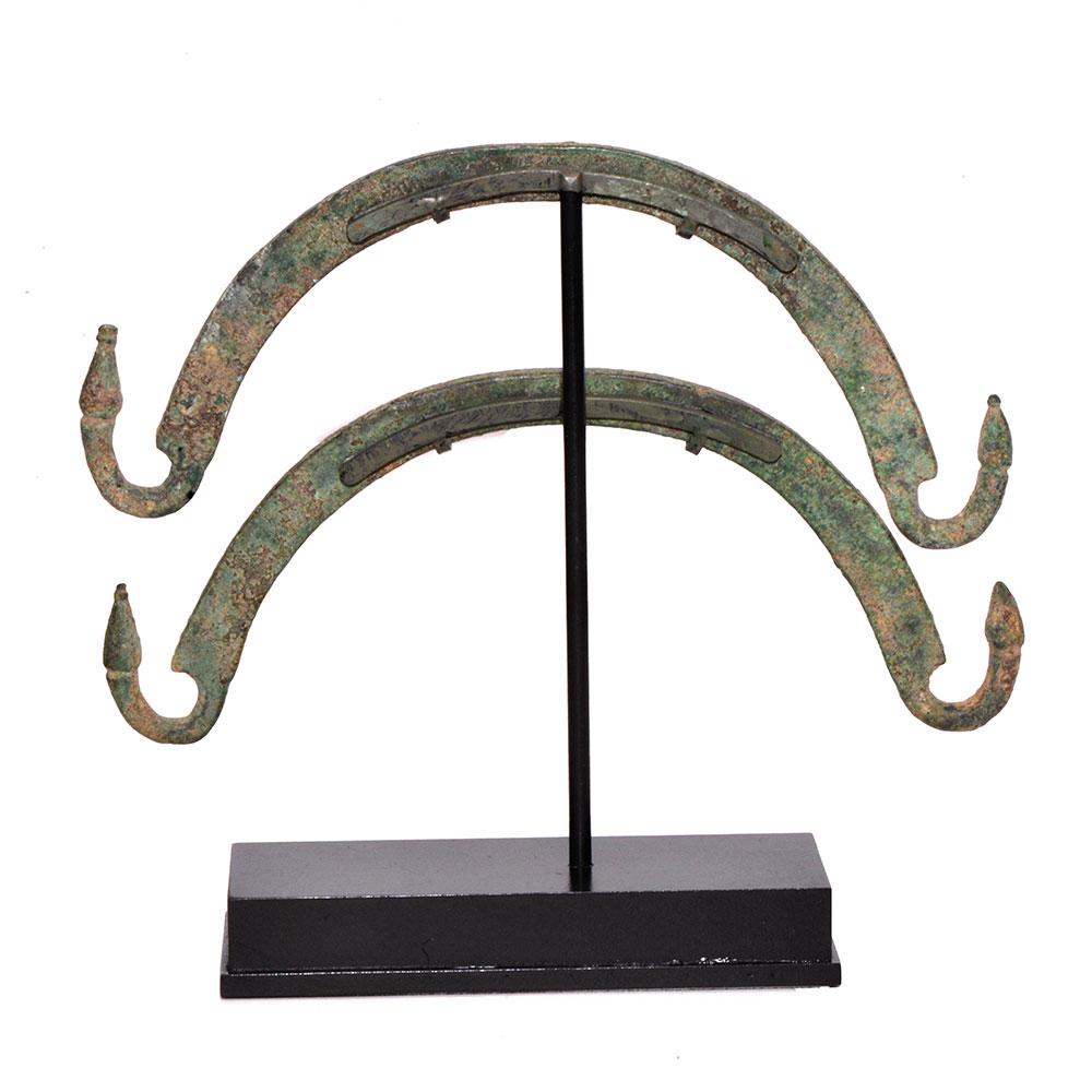 A Pair of Etruscan Bronze Situla Handles, ca. 4th century BCE