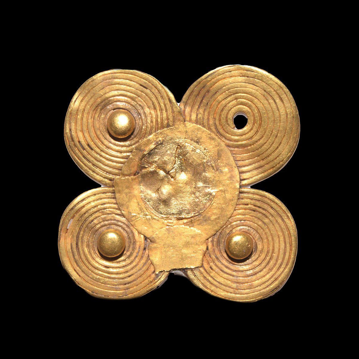 An Etruscan four Leaf Gold Spiral Fibula, ca. 800 - 700 BCE