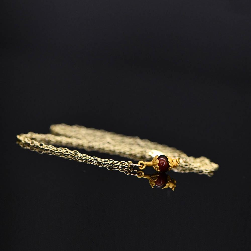 A Greek Gold and Garnet Pendant, Hellenistic Period, ca. 3rd - 1st century BCE