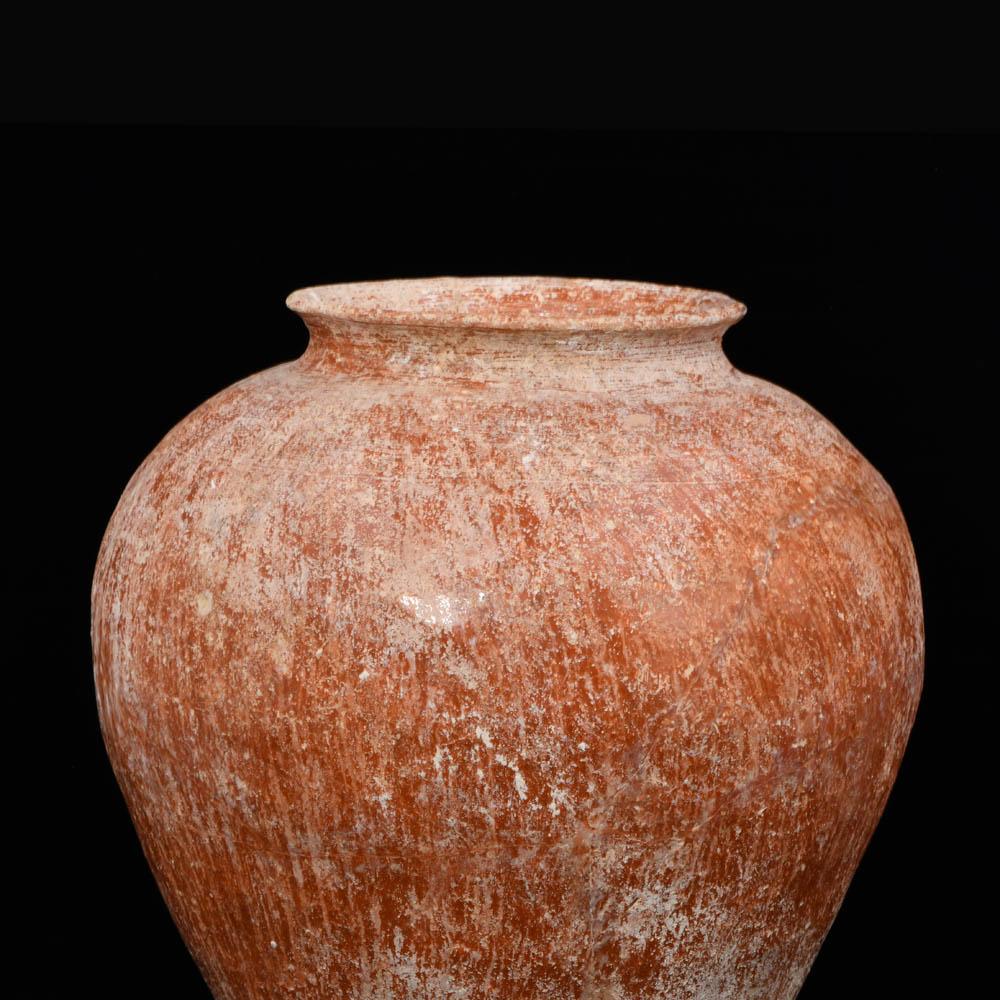 A Canaanite Piriform Redware Jar, Early Bronze Age, ca. 3rd millennium BCE