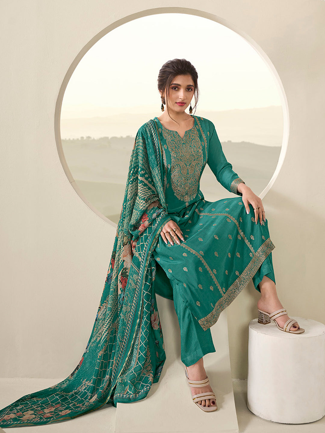 Viridian Green Muslin Jacquard Kurta . Paired with Santoon Straight pants and Muslin Jacquard Abstract Digital Print Dupatta