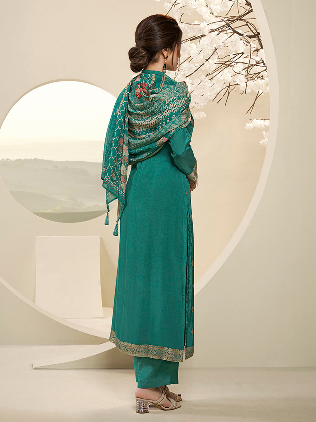 Viridian Green Muslin Jacquard Kurta . Paired with Santoon Straight pants and Muslin Jacquard Abstract Digital Print Dupatta