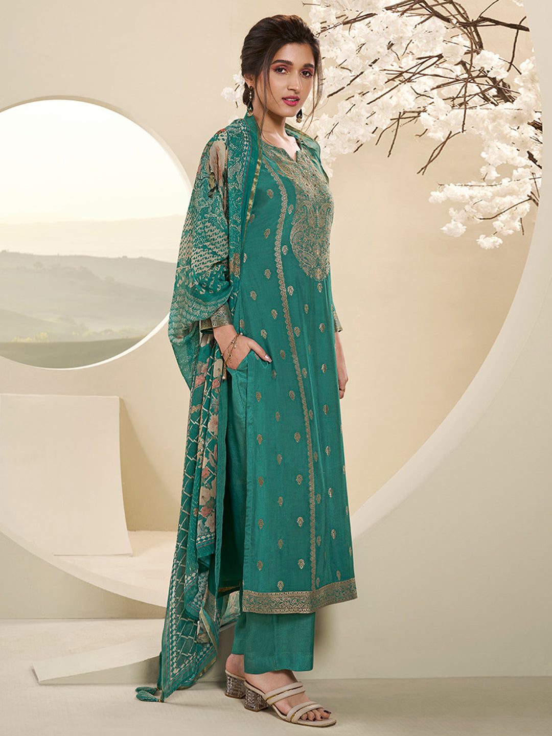 Viridian Green Muslin Jacquard Kurta . Paired with Santoon Straight pants and Muslin Jacquard Abstract Digital Print Dupatta