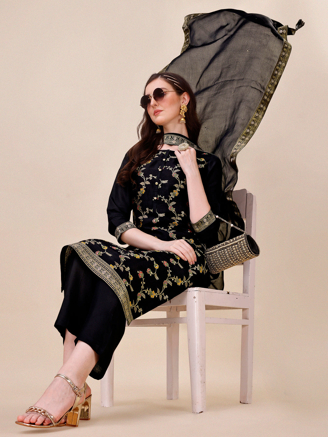 Black Dola Silk Jacquard Kurta . Paired with Santoon Trouser and Chinon Dupatta