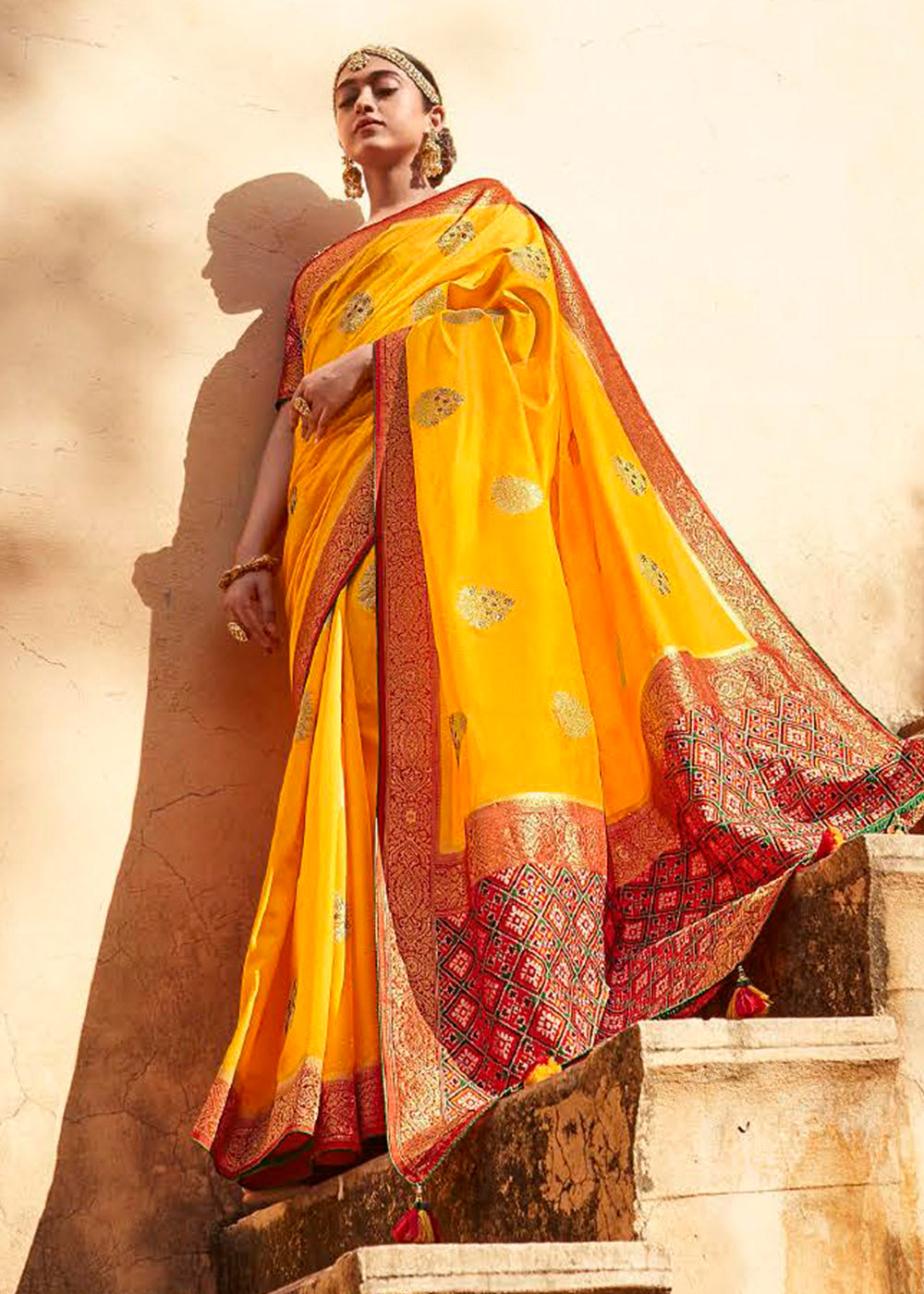 Saffron Yellow Woven Banarasi Patola Silk Saree with Embroidered Blouse