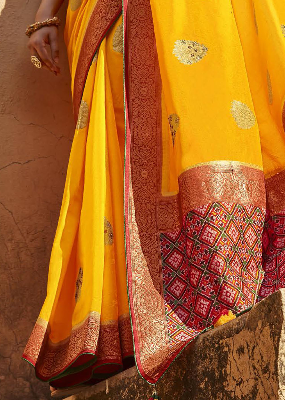 Saffron Yellow Woven Banarasi Patola Silk Saree with Embroidered Blouse