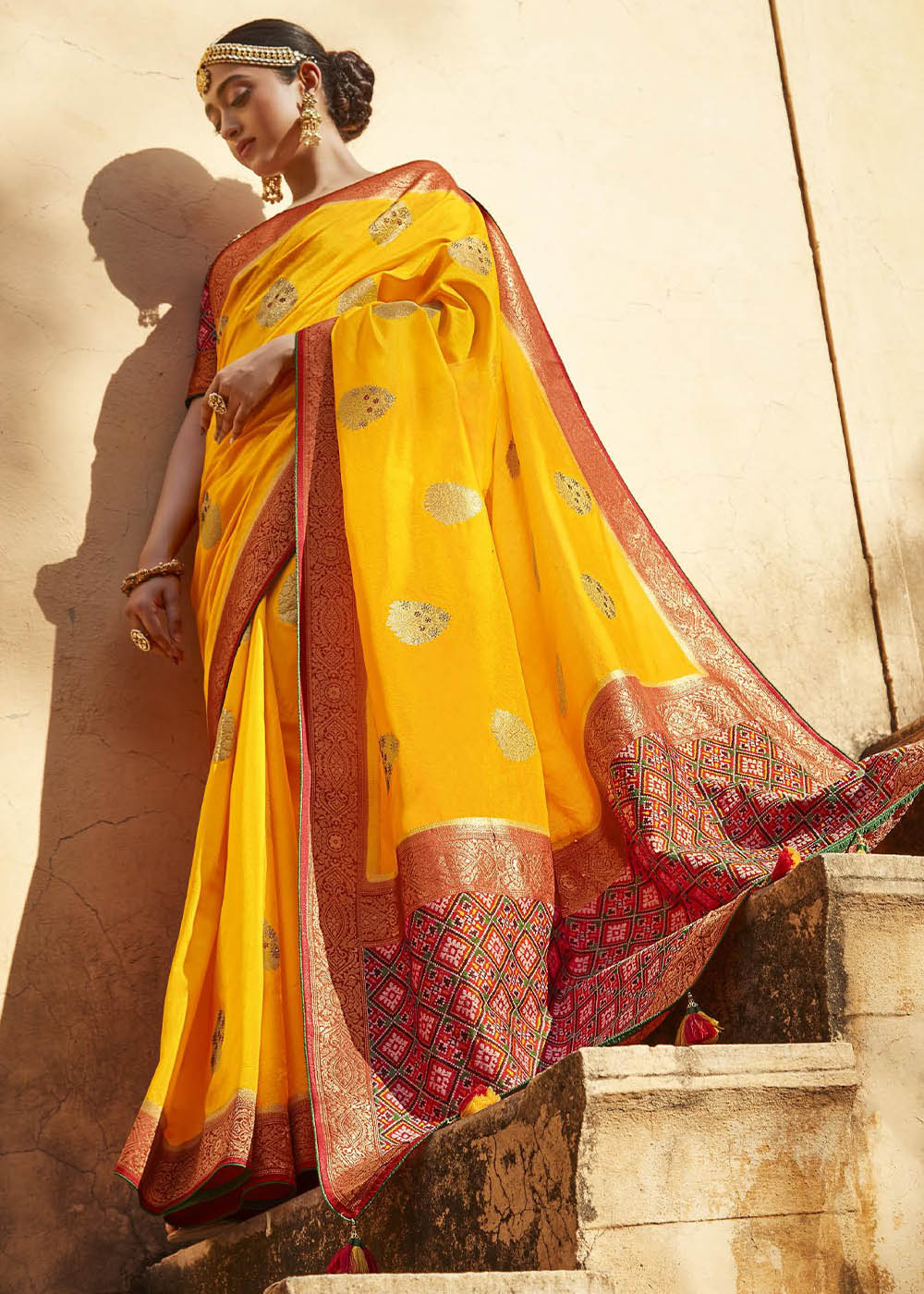 Saffron Yellow Woven Banarasi Patola Silk Saree with Embroidered Blouse