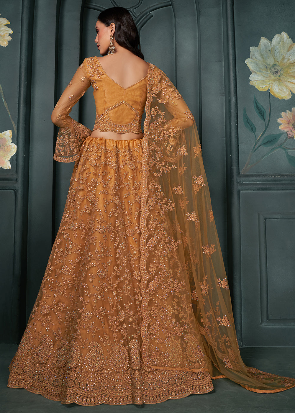 Copper Brown Net Lehenga Choli Beautifully Embroidered with Thread, Badla work & all Over Embellishments Stone work