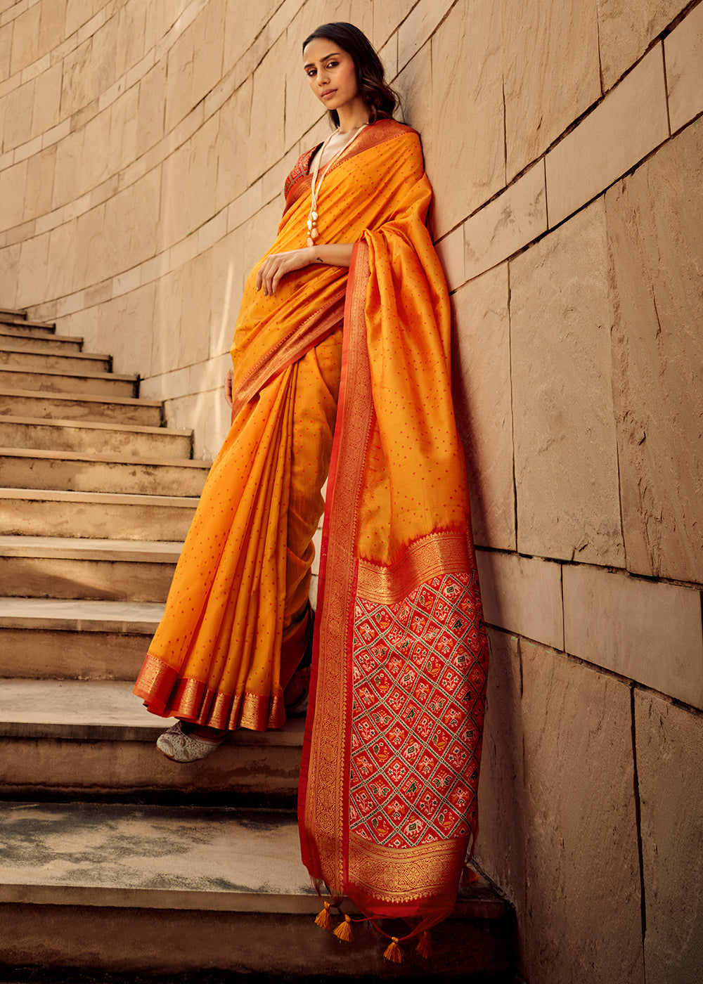 Saffron Yellow Woven Patola Silk Saree