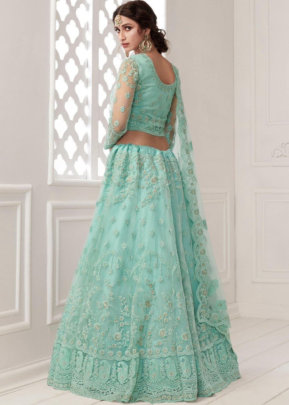 Turquoise Blue Soft Net Lehenga Choli with Cording, Stonework, Thread & Badla Embroidery