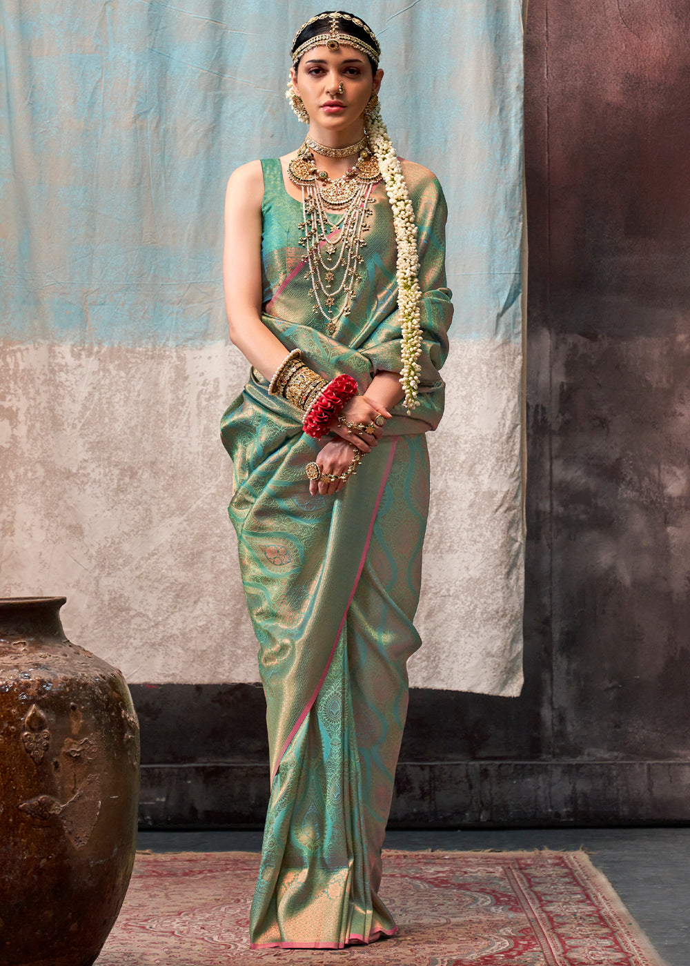 Pastel Green Two Tone Kanjivaram Silk Saree Embellished with Intricate Gold Zari work : Top Pick