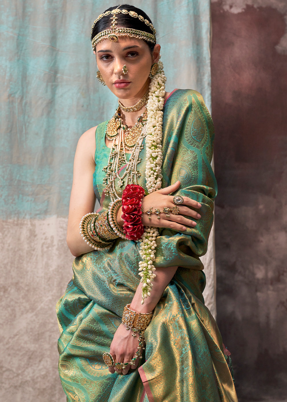 Pastel Green Two Tone Kanjivaram Silk Saree Embellished with Intricate Gold Zari work : Top Pick