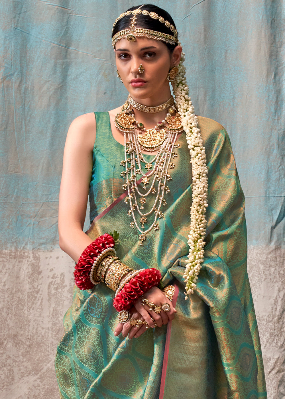 Pastel Green Two Tone Kanjivaram Silk Saree Embellished with Intricate Gold Zari work : Top Pick