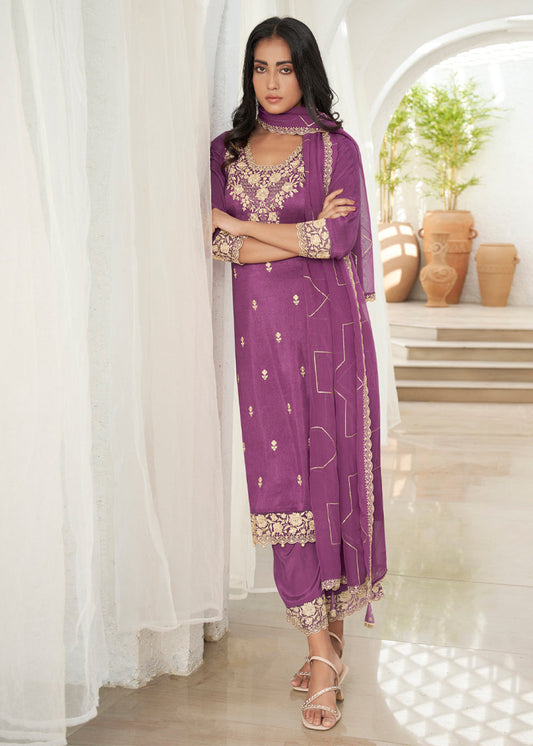 Plum Purple Dola Silk Kurta. Paired with Santoon Straight Pants and Organza Dupatta