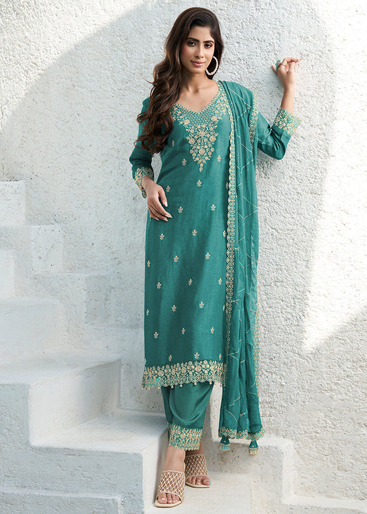 EEmbrace Green Dola Silk Kurta. Paired with Santoon Straight Pants and Organza Dupatta