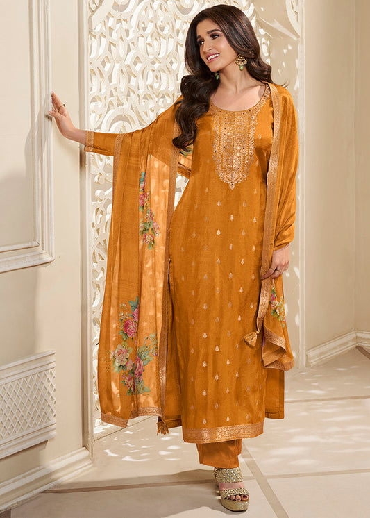 Yellow Ochre Dola Silk Kurta. Paired with Santoon Straight Pants and Chinon Floral Printed Dupatta.