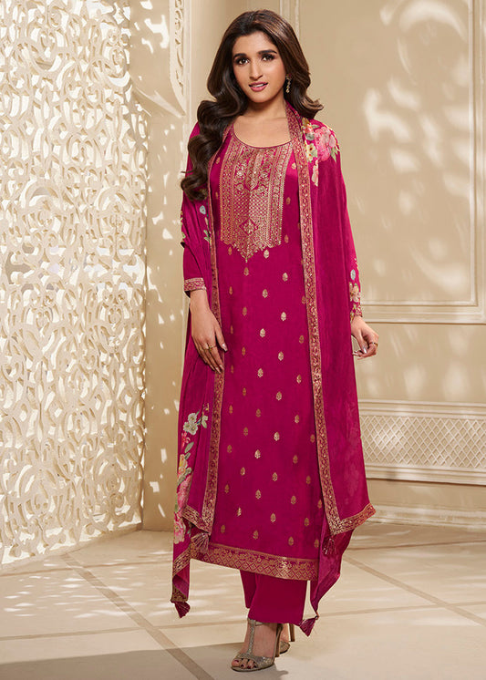 Magenta Pink Dola Silk Kurta . Paired with Santoon Straight Pants and Chinon Floral Printed Dupatta.