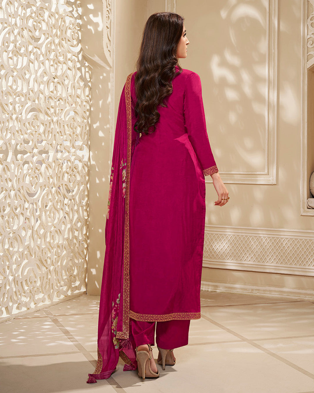 Magenta Pink Dola Silk Kurta . Paired with Santoon Straight Pants and Chinon Floral Printed Dupatta.