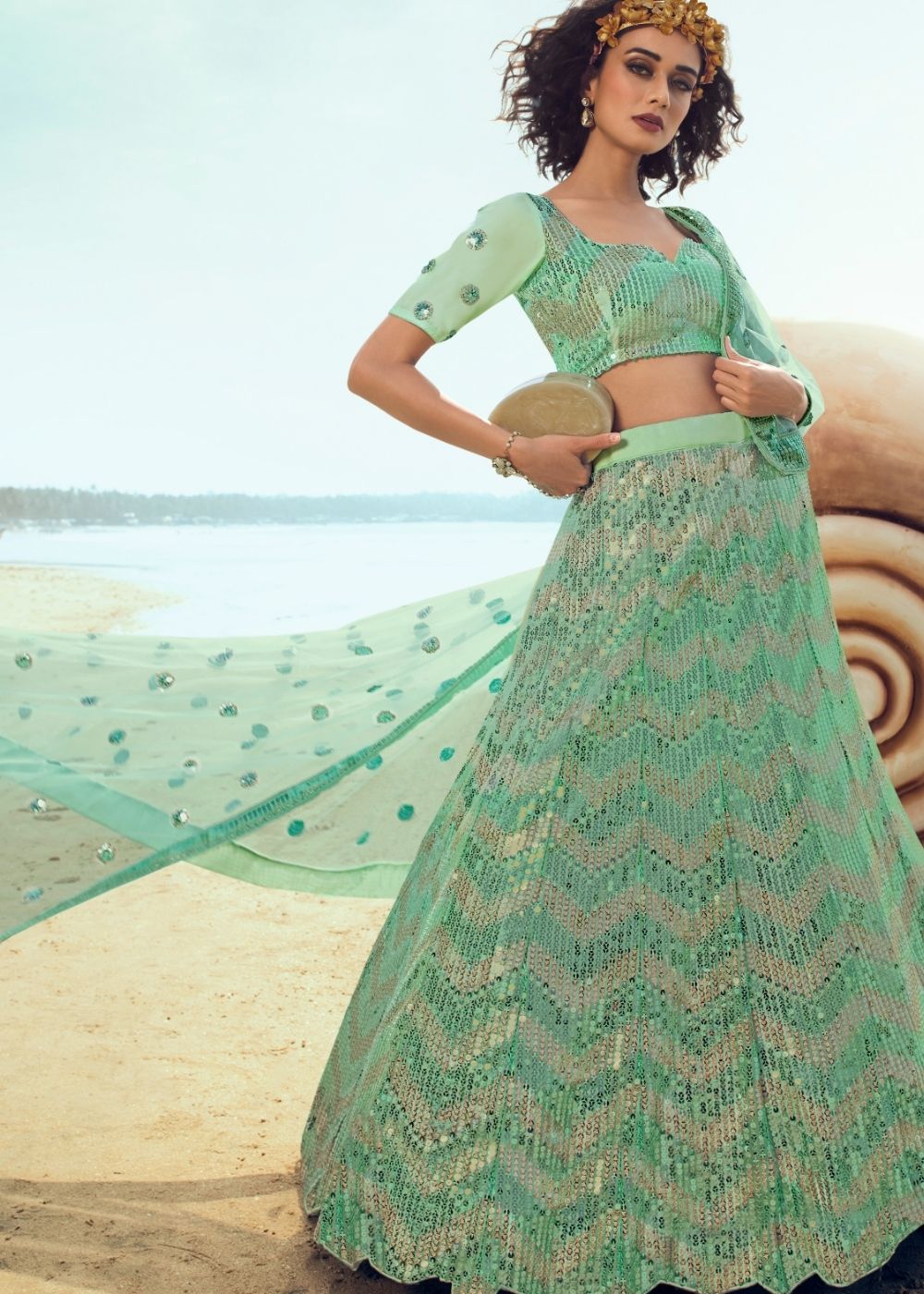 Mint Green Soft Net Designer Lehenga Choli with overall Sequins work