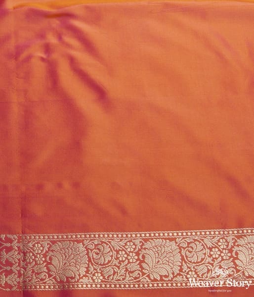 Mango yellow dual tone kadhiyal border saree with a kadhwa booti and pink selvedge