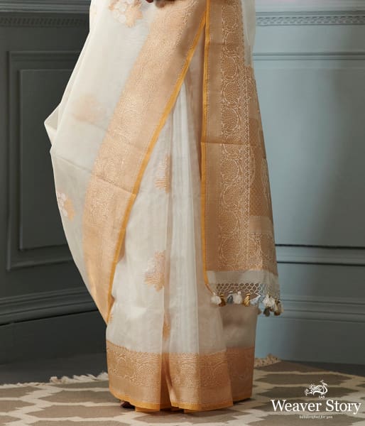 Ivory and gold banarasi kora saree with beldar border and kadhwa booti