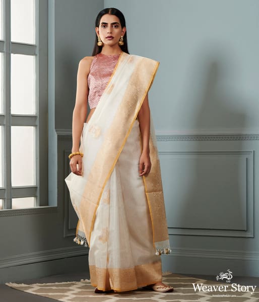 Ivory and gold banarasi kora saree with beldar border and kadhwa booti