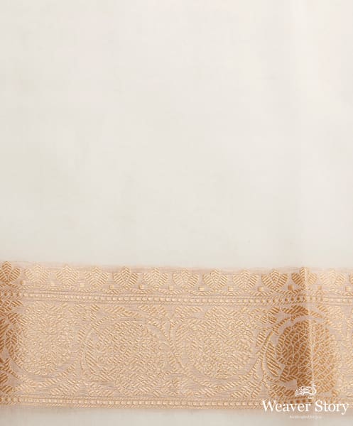 Ivory and gold banarasi kora saree with beldar border and kadhwa booti