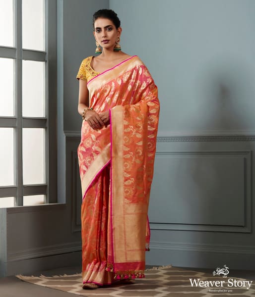 Handwoven Banarasi saree in Oramge and peach dual tone with floral jaal