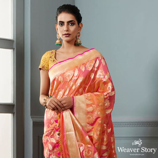 Handwoven Banarasi saree in Oramge and peach dual tone with floral jaal