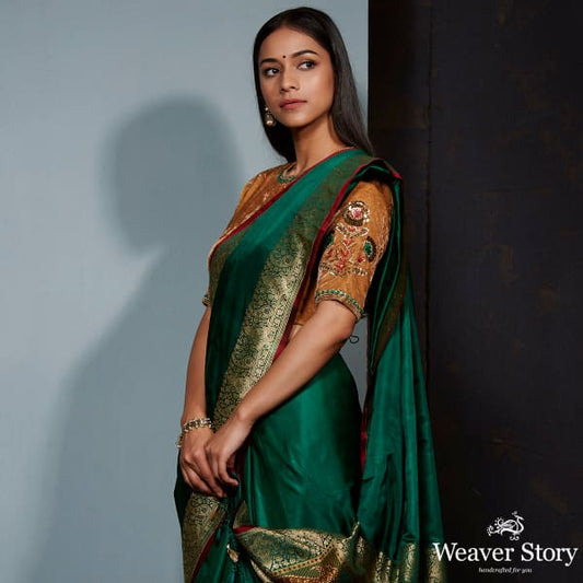 Green and gold pure valkalam saree with meenakari border and paisley pallu