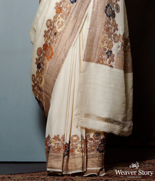 Offwhite munga silk saree with floral meenakari border