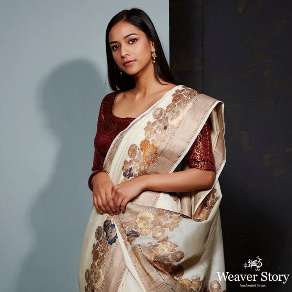 Offwhite munga silk saree with floral meenakari border