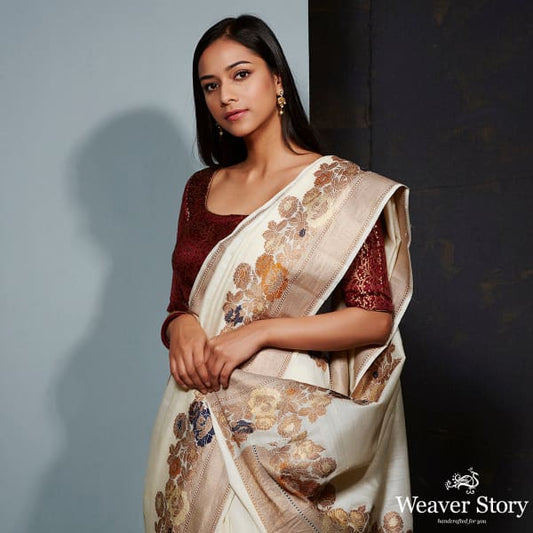 Offwhite munga silk saree with floral meenakari border