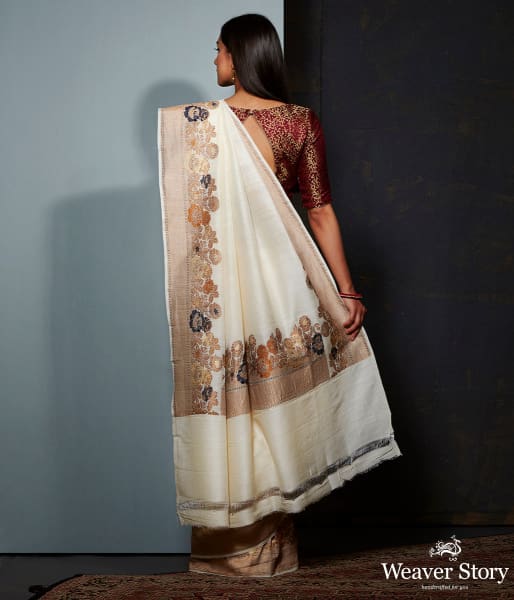 Offwhite munga silk saree with floral meenakari border