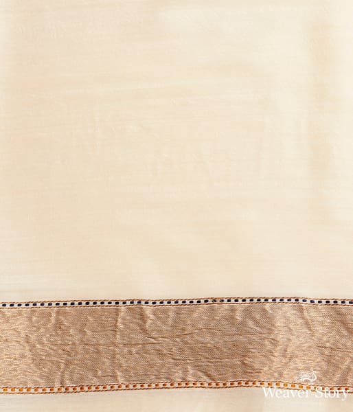 Offwhite munga silk saree with floral meenakari border