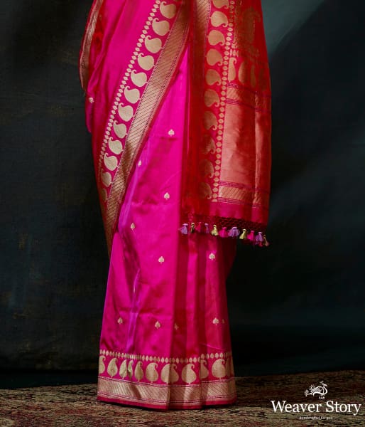 Hot Pink kadhwa booti saree with paisleys on border and konia pallu