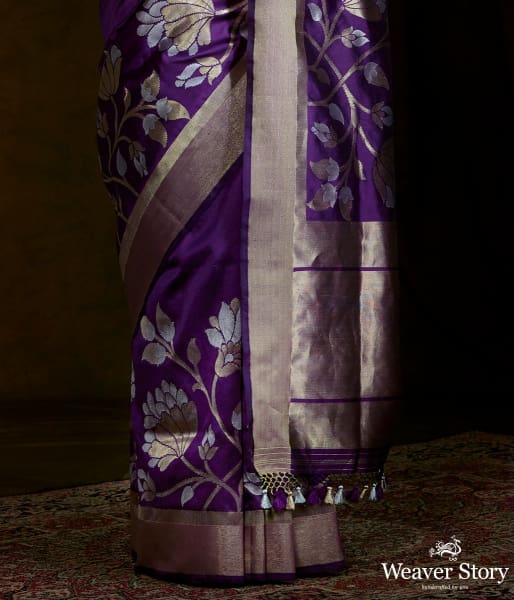 Handwoven dupion silk banarasi with floral borders woven in sona rupa zari
