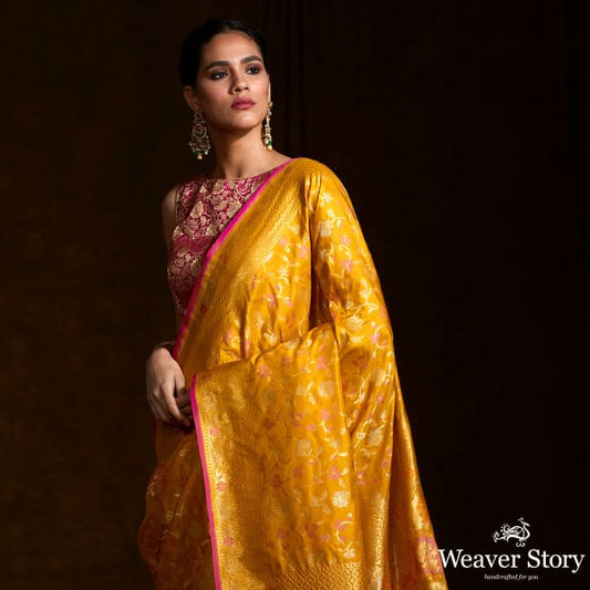 Handwoven Banarasi katan silk saree in mustard yellow with meenakari jaal