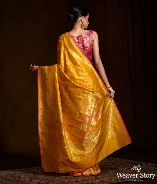 Handwoven Banarasi katan silk saree in mustard yellow with meenakari jaal