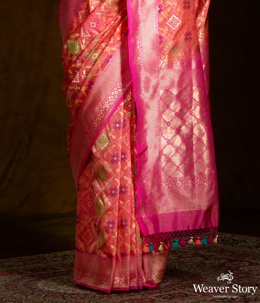 Handwoven Banarasi Patola saree in peach and pink dual tone
