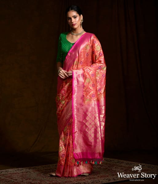 Handwoven Banarasi Patola saree in peach and pink dual tone