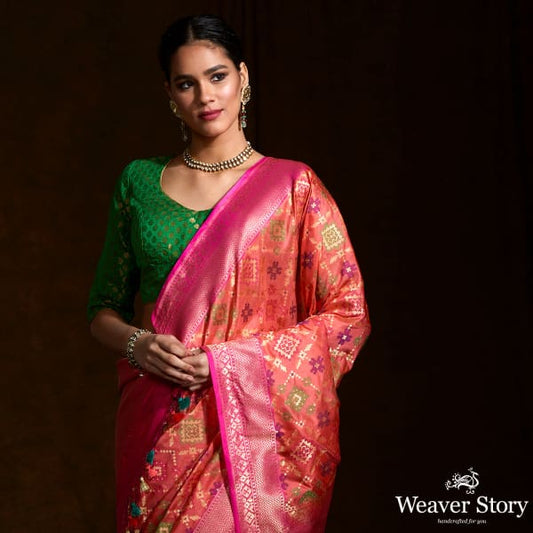 Handwoven Banarasi Patola saree in peach and pink dual tone