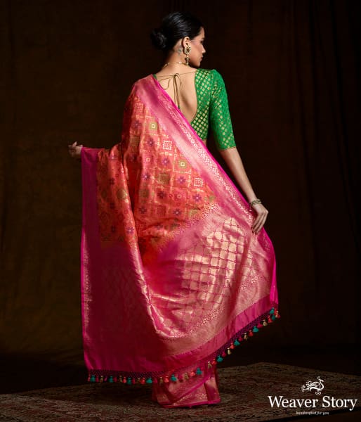 Handwoven Banarasi Patola saree in peach and pink dual tone
